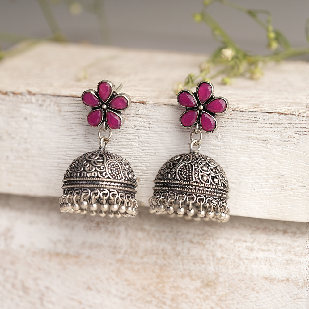 Champika- Silver Brass Stone Studded Jhumka Earrings(Red)