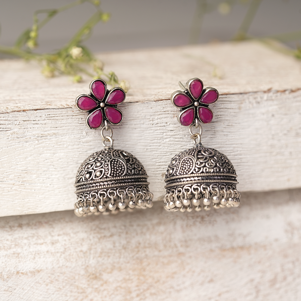 Champika- Silver Brass Stone Studded Jhumka Earrings(Red)