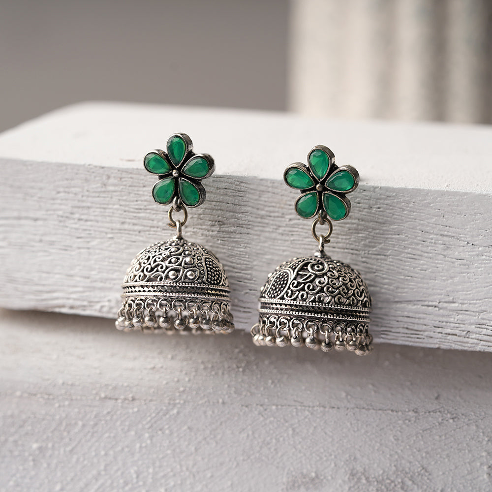 Champika- Silver Brass Stone Studded Jhumka Earrings(Green)