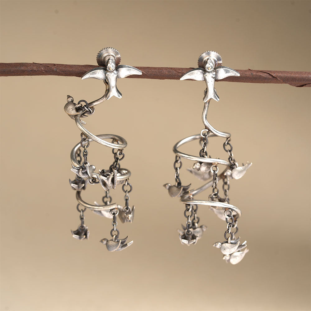 Dayita- Silver Charm Studded Dangler Earrings