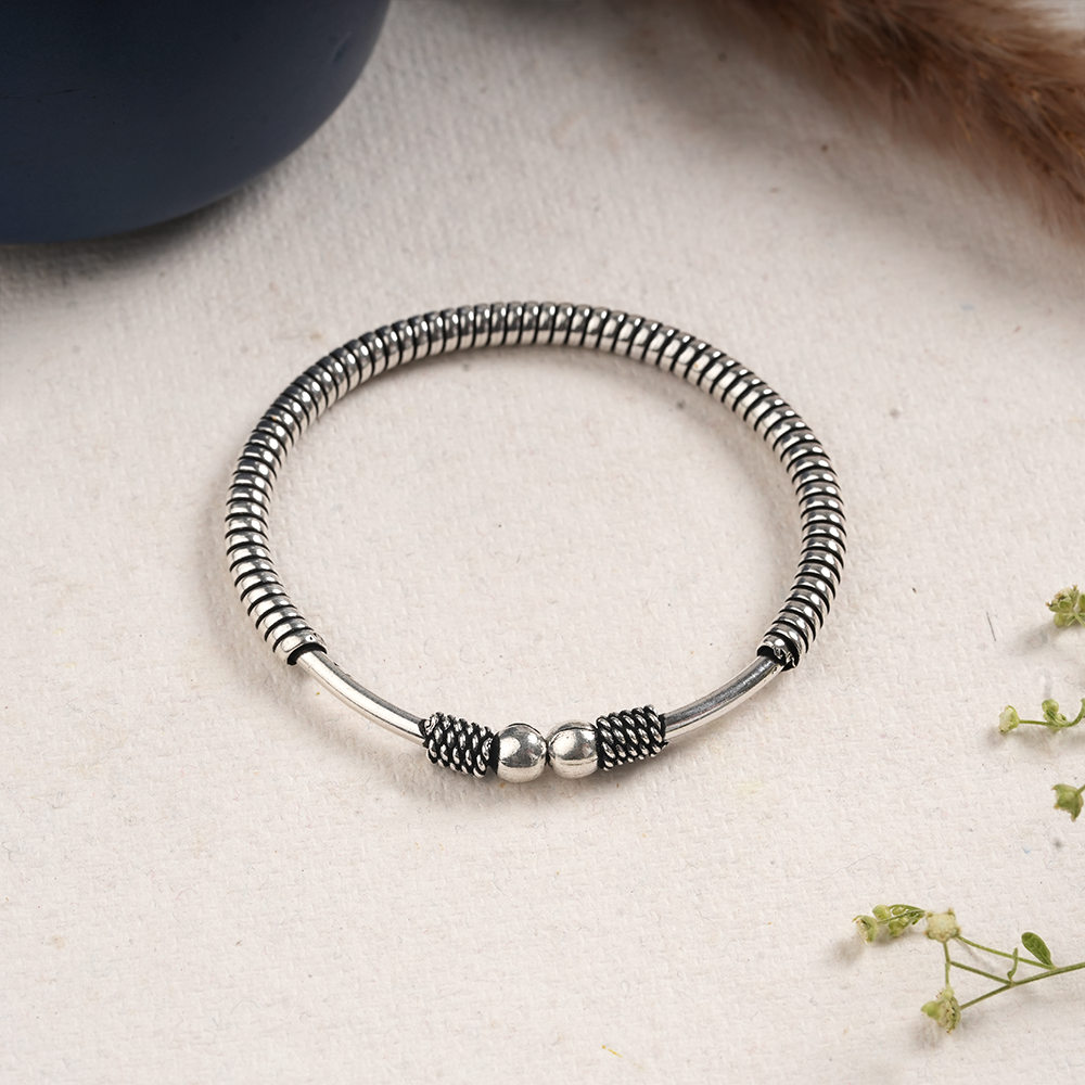 Tarang- Oxidised brass bracelet.