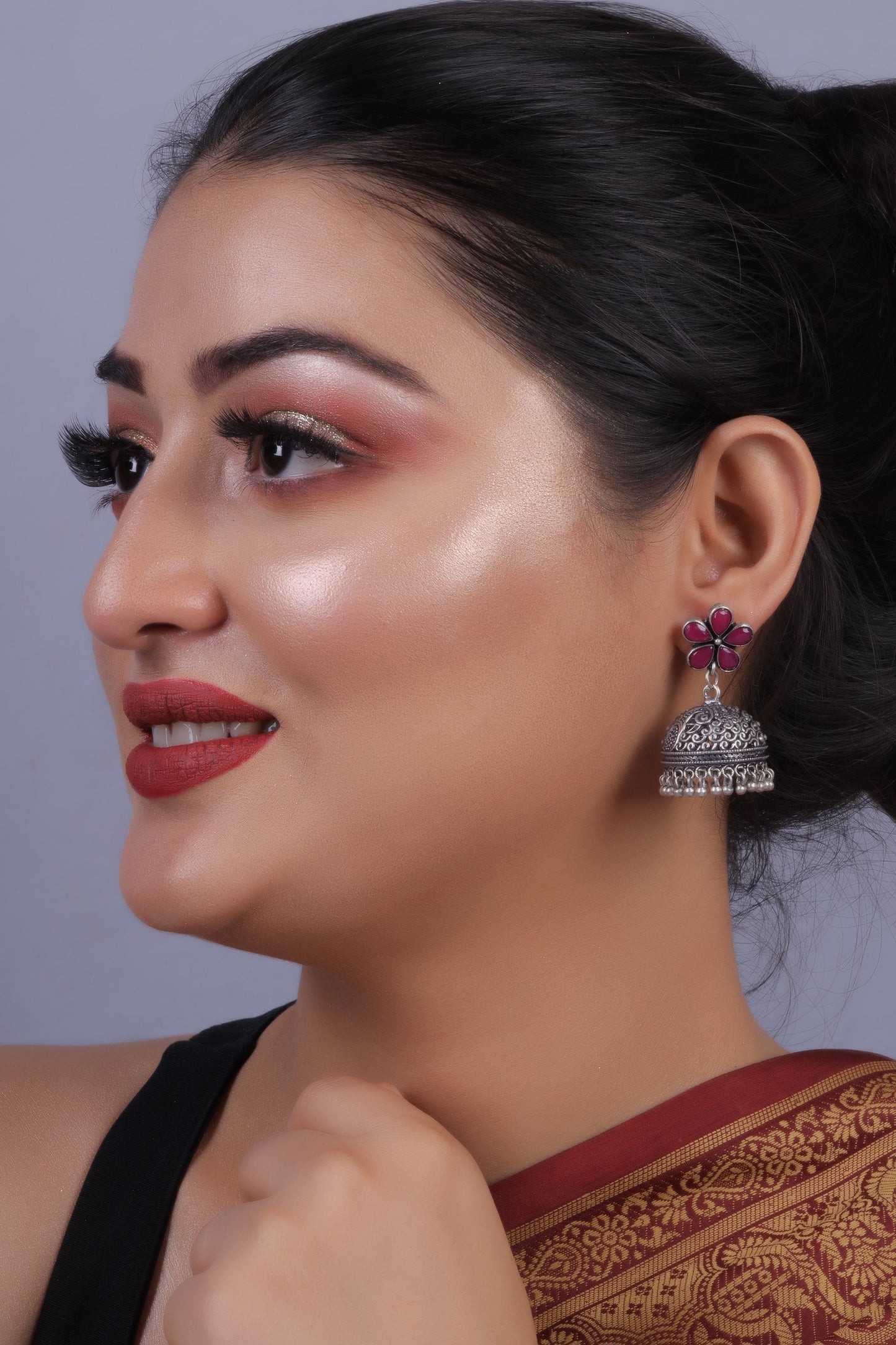 Champika- Silver Brass Stone Studded Jhumka Earrings(Red)