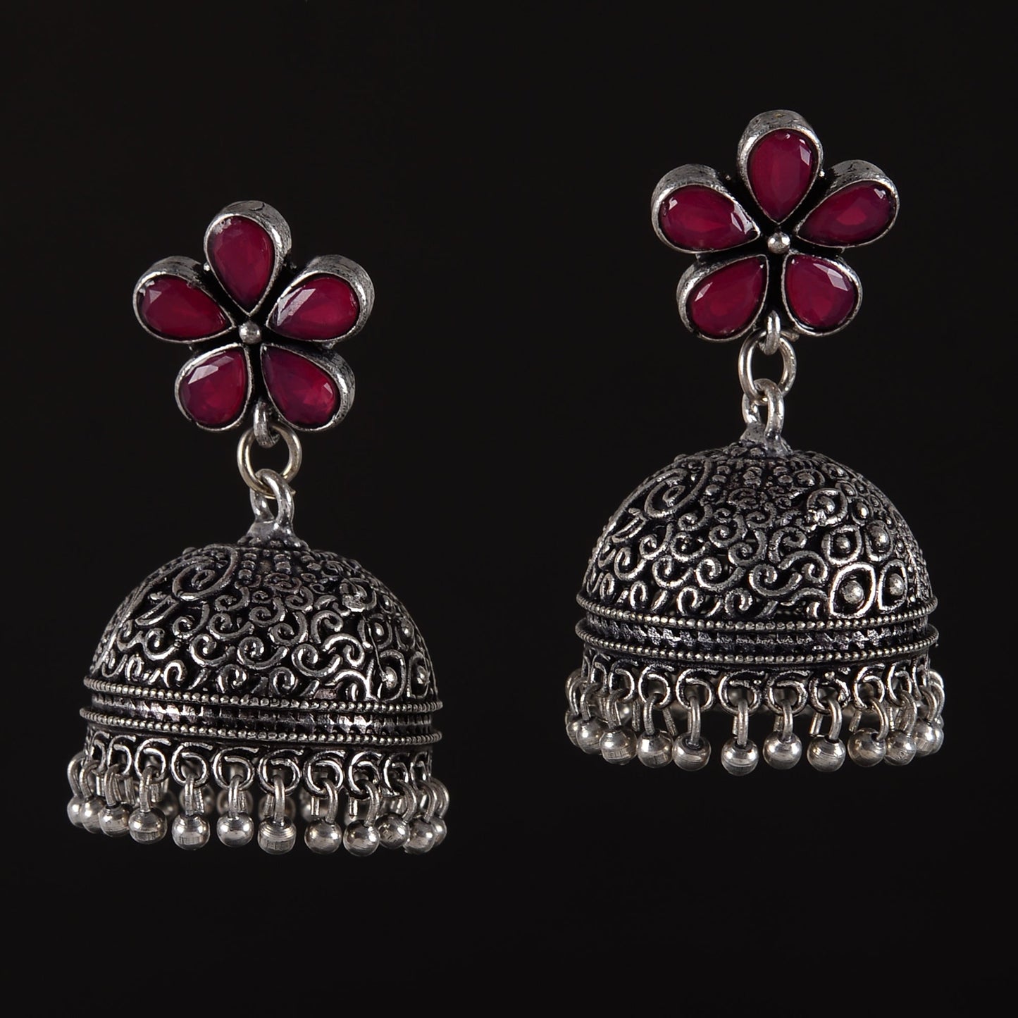 Champika- Silver Brass Stone Studded Jhumka Earrings(Red)