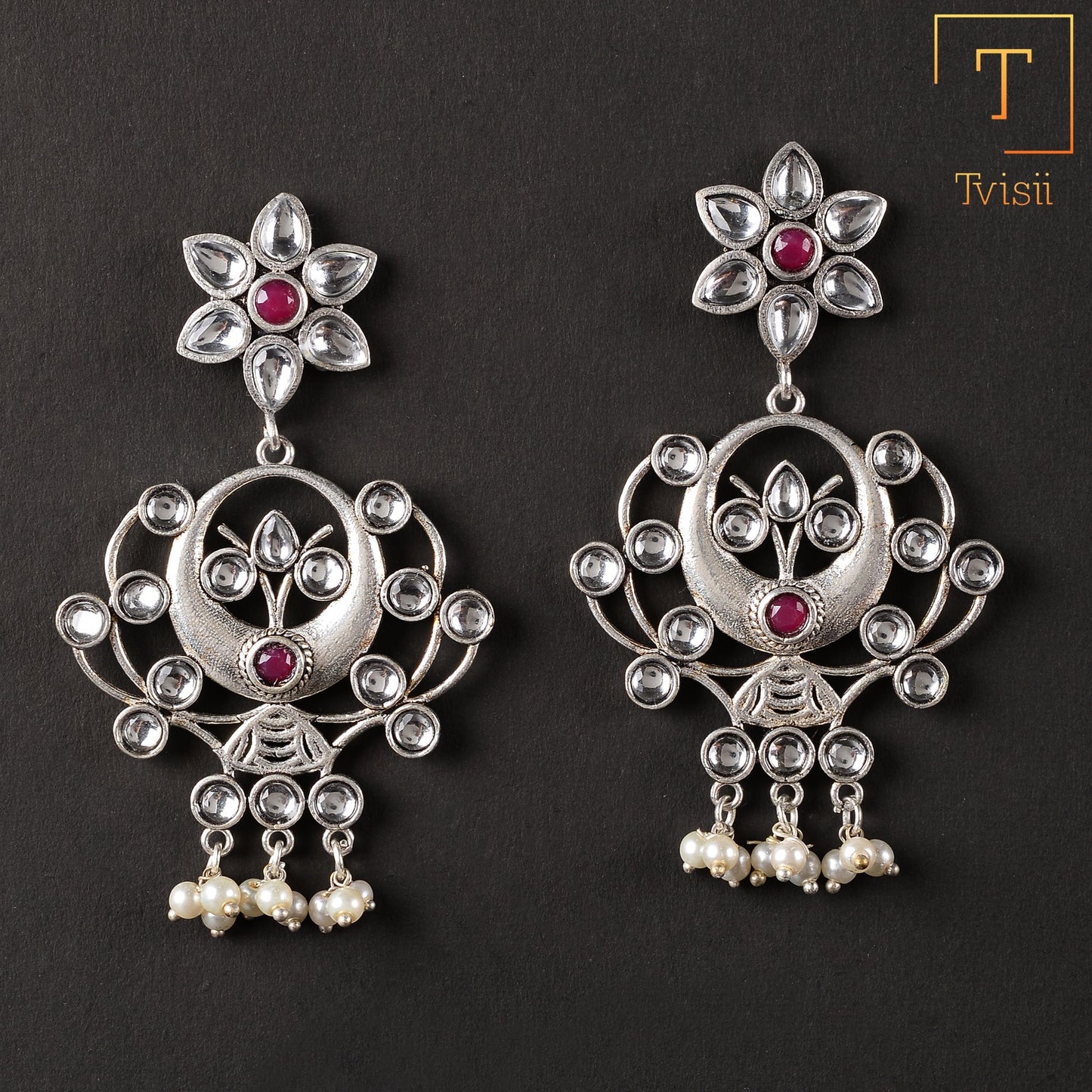 Dhaval- Silver Brass Oxidised dangler earrings(Multicolored)