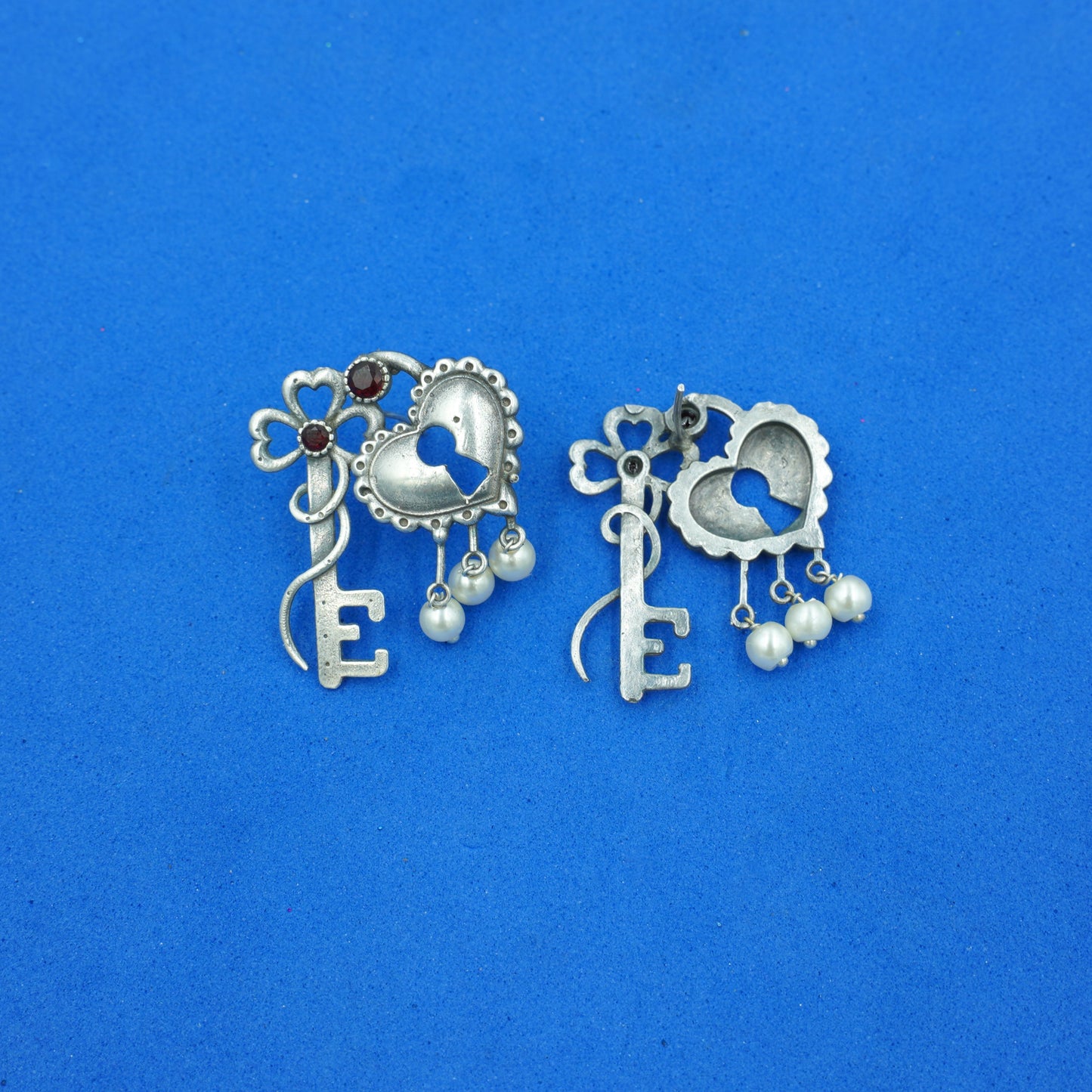 Kunjika- Silver Brass Oxidised dangler earrings(Red)