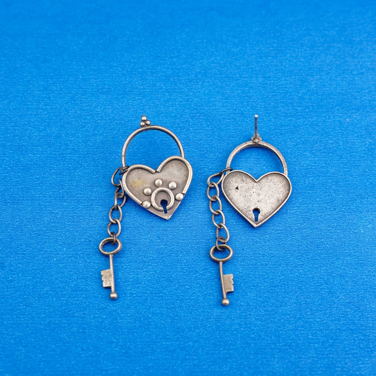 PremTaala- Silver Brass Oxidised dangler earrings