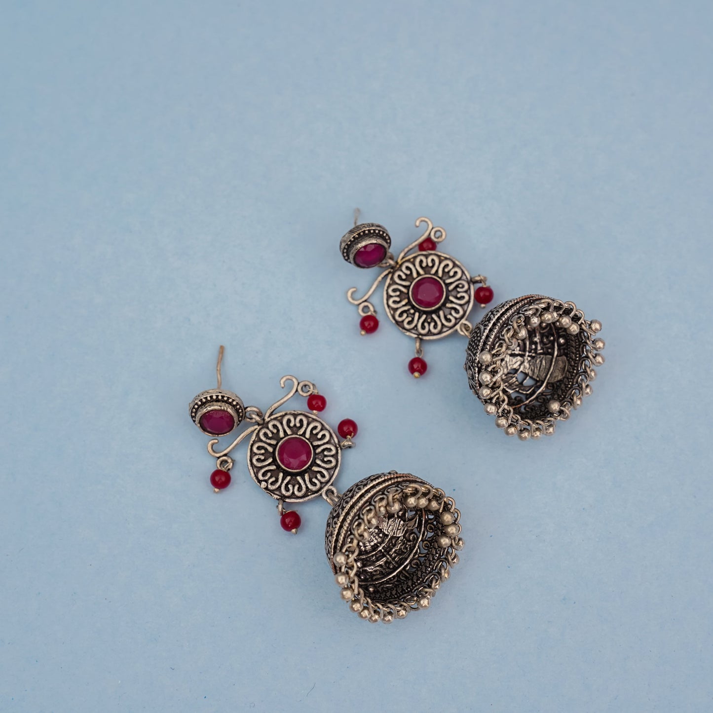 Mallika- Silver Brass Oxidised Jhumka Earrings(Red)