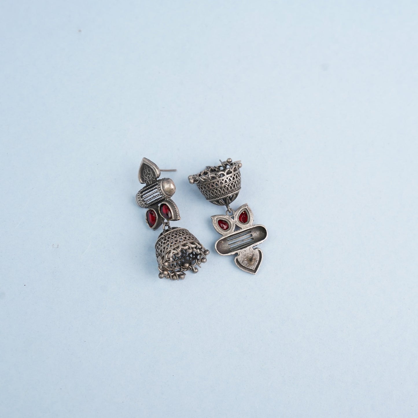 Taal- Silver Brass Oxidised jhumka earrings(Red)