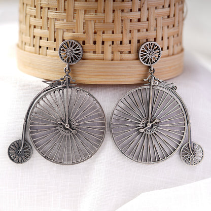 RatnaChakra- Silver Brass Oxidised dangler earrings
