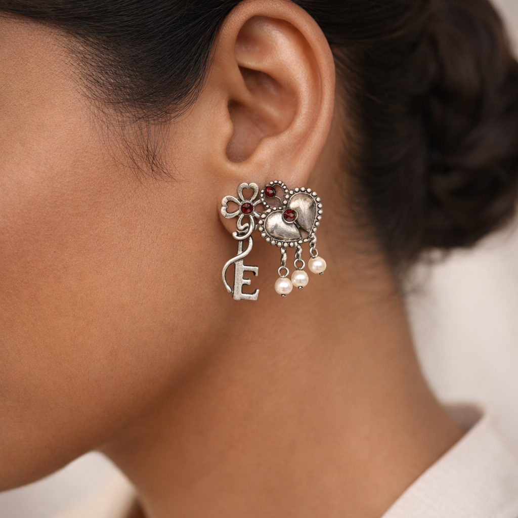 Kunjika- Silver Brass Oxidised dangler earrings(Red)