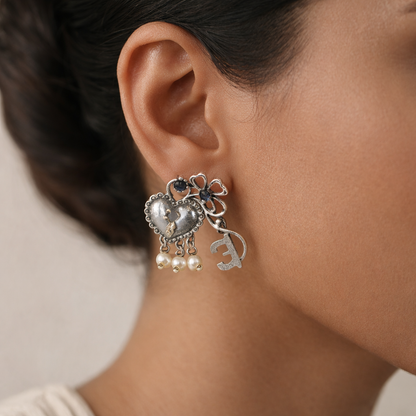 Kunjika- Silver Brass Oxidised dangler earrings(Black)
