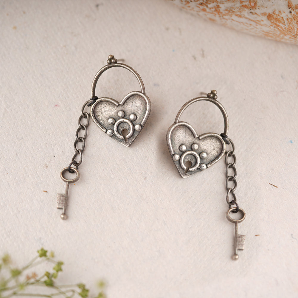PremTaala- Silver Brass Oxidised dangler earrings