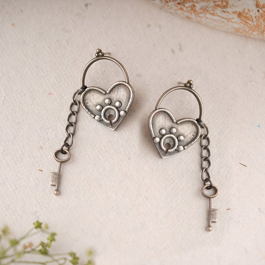 PremTaala- Silver Brass Oxidised dangler earrings
