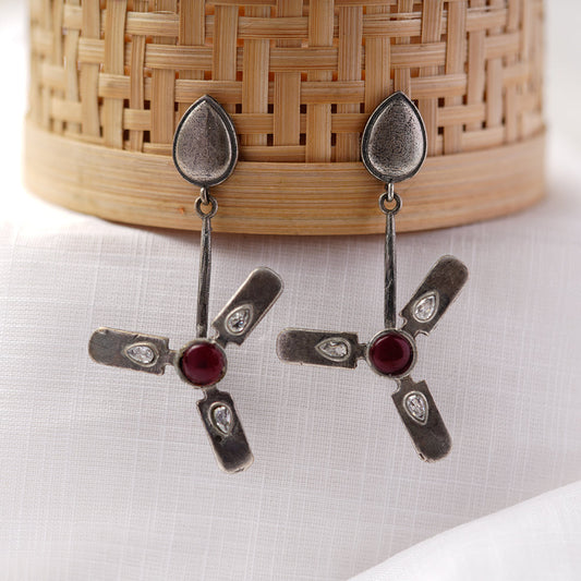 Pawan- Silver Brass Oxidised dangler earrings