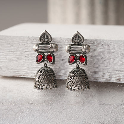 Taal- Silver Brass Oxidised jhumka earrings(Red)