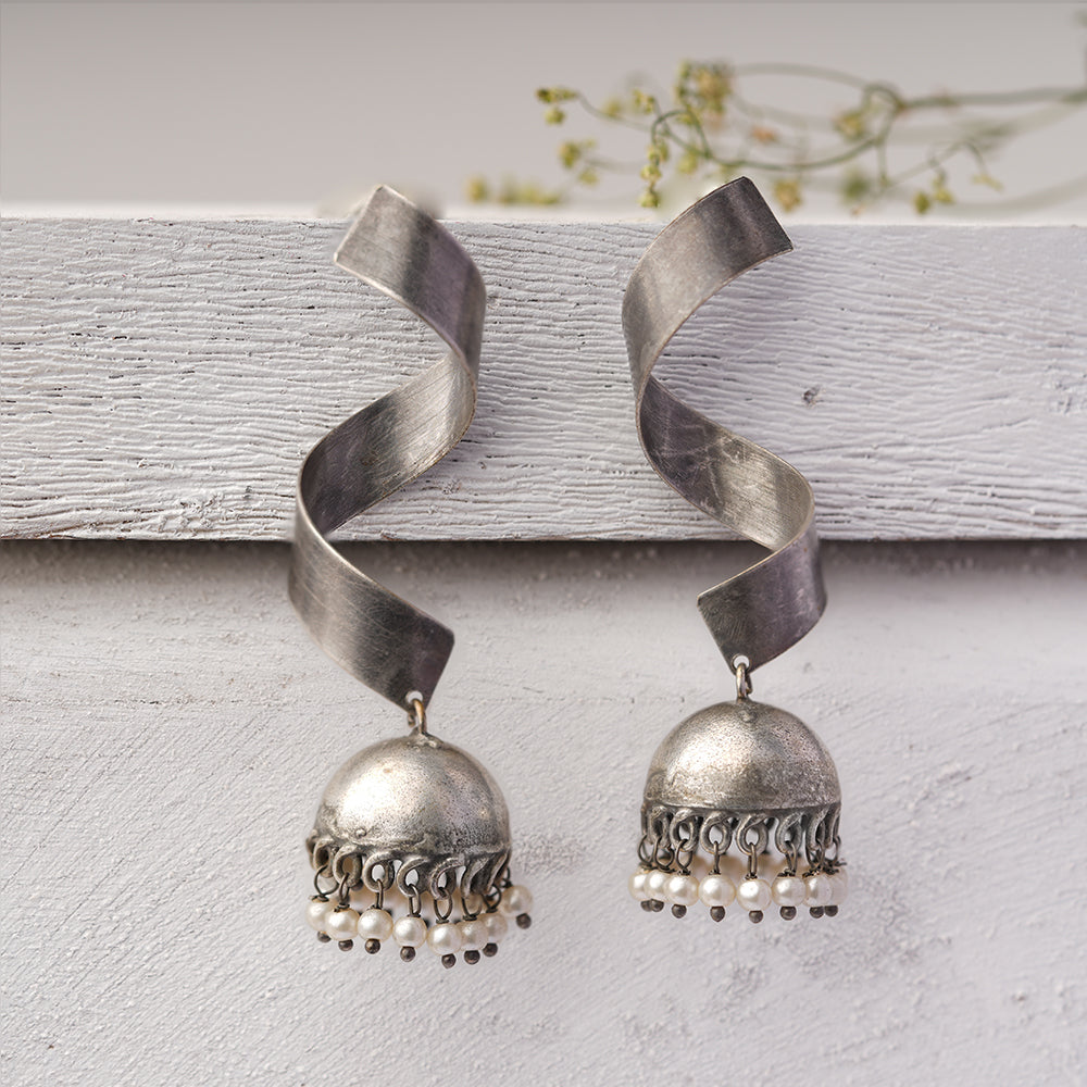 Meghika- Silver Toned Brass Jhumka Earrings