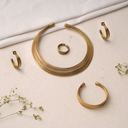 Chitrangada- Multistrand Brass polished Hasli with Earrings & Adjustable Ring