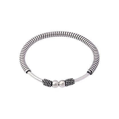 Tarang- Oxidised brass bracelet.