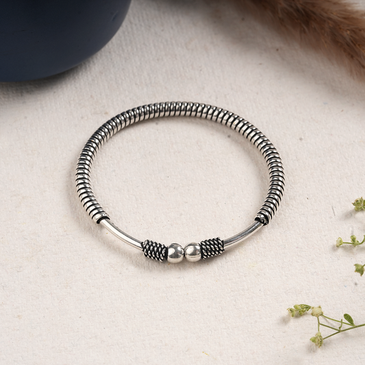 Tarang- Oxidised brass bracelet.