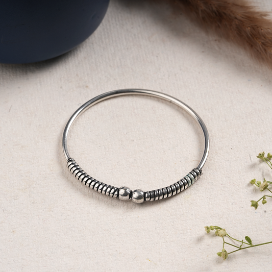 Tejas- Oxidised brass bracelet.
