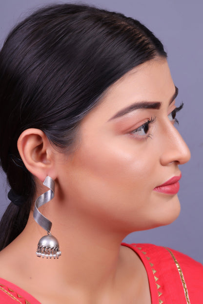 Meghika- Silver Toned Brass Jhumka Earrings