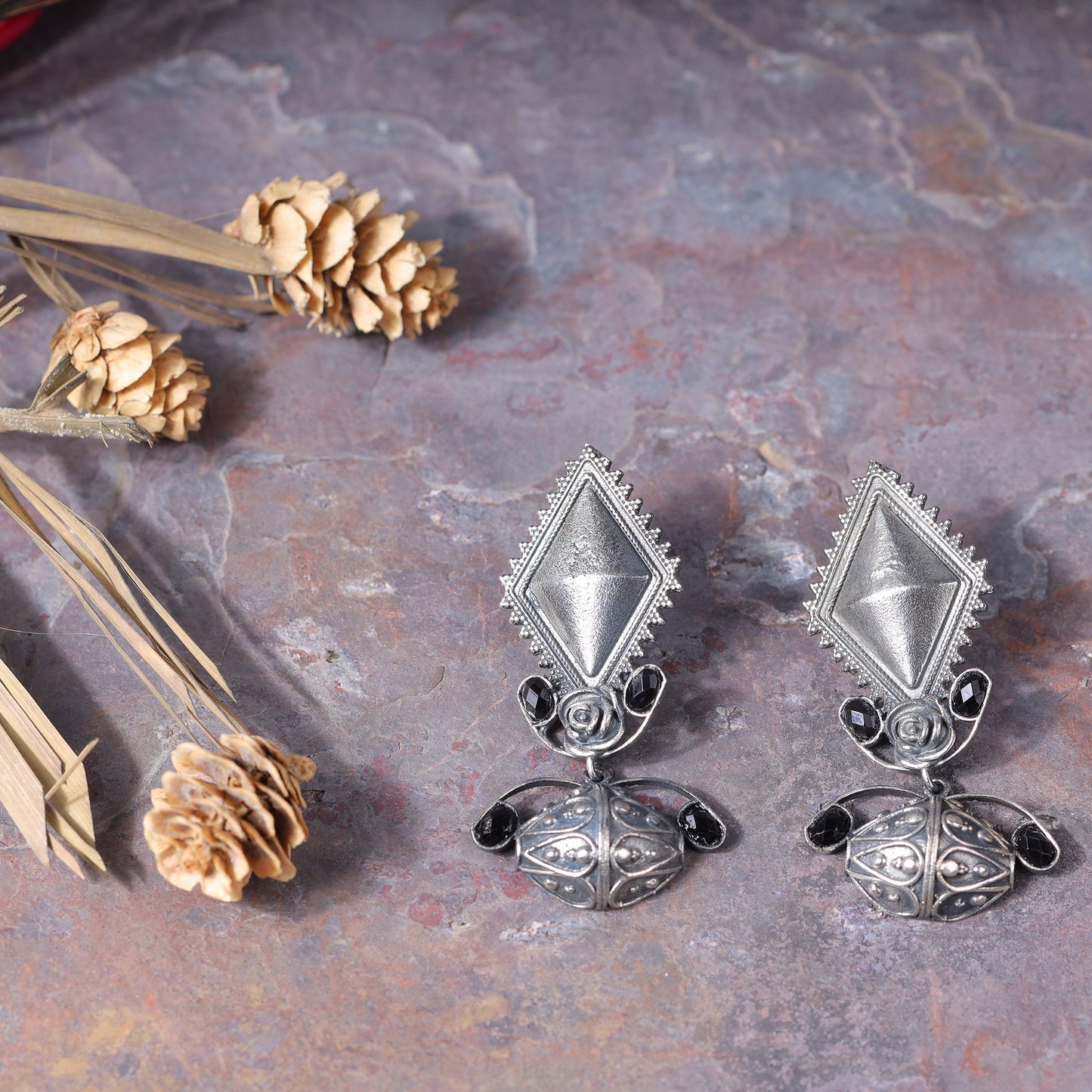 Suvarna- Silver Brass Oxidised dangler earrings