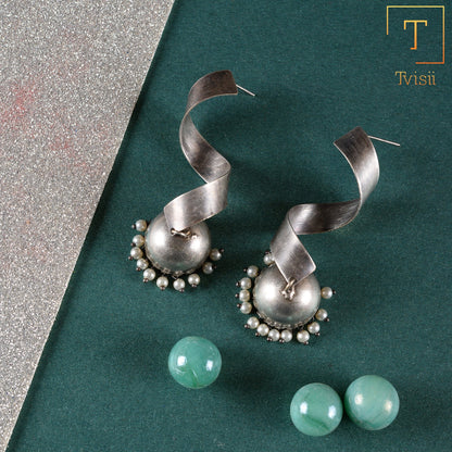 Meghika- Silver Toned Brass Jhumka Earrings