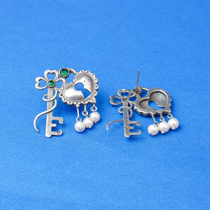 Kunjika- Silver Brass Oxidised dangler earrings (Green)
