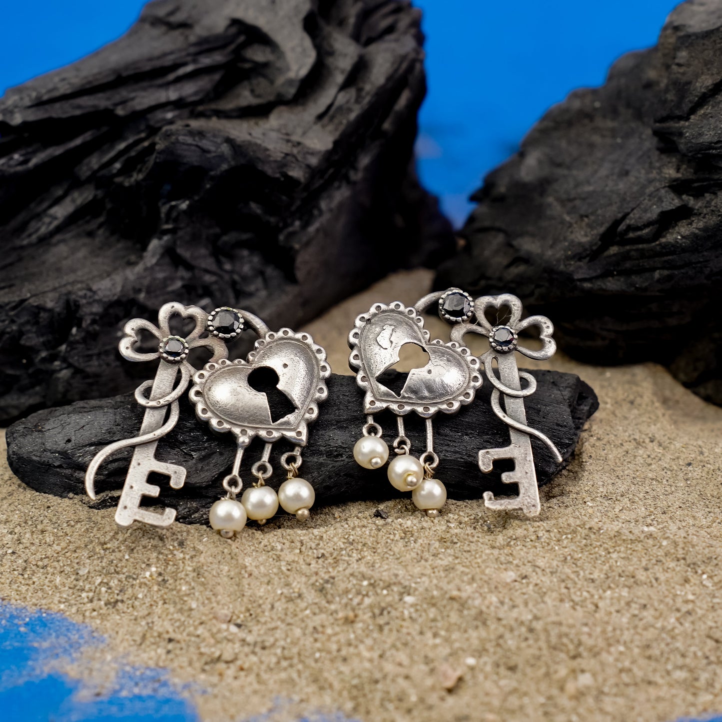 Kunjika- Silver Brass Oxidised dangler earrings(Black)