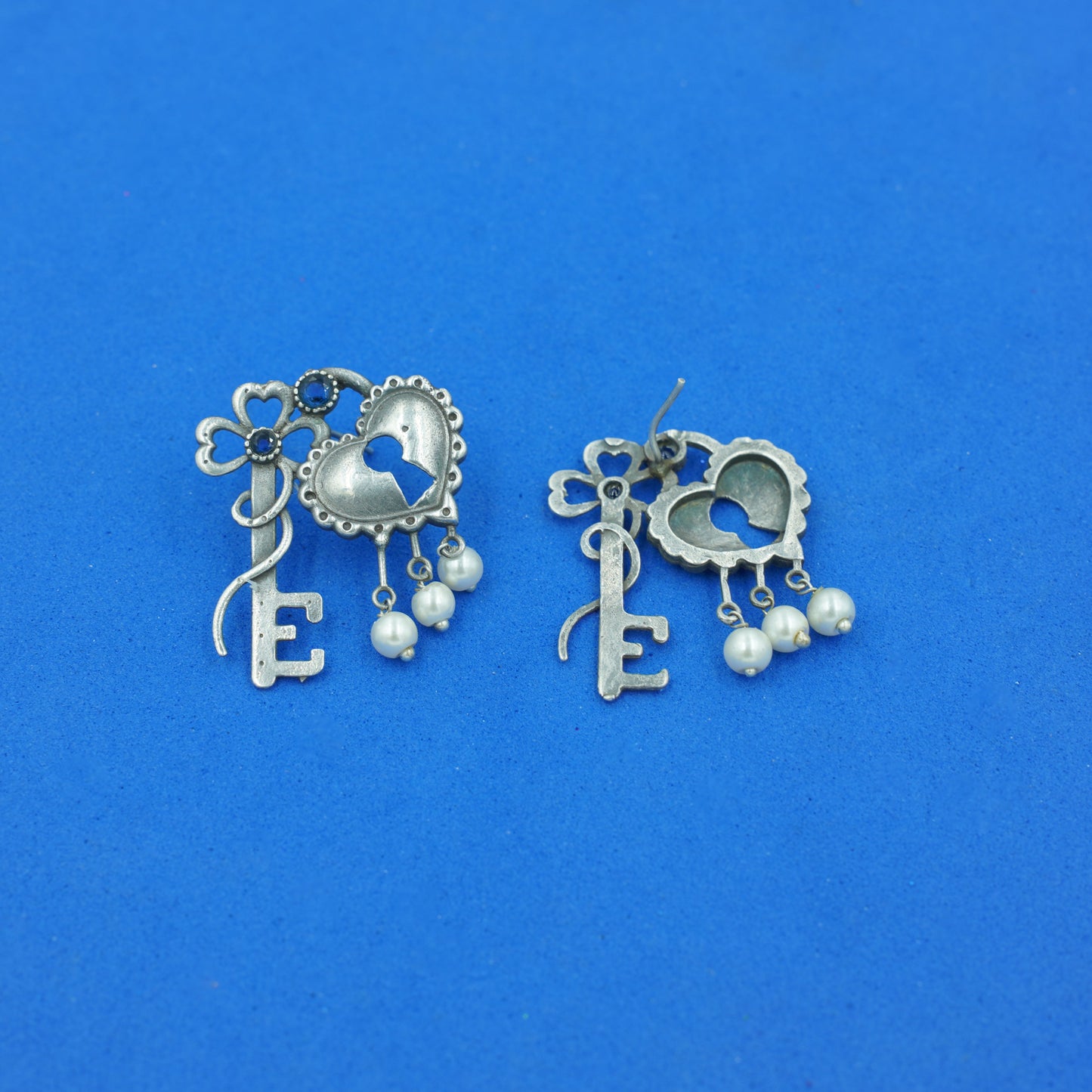 Kunjika- Silver Brass Oxidised dangler earrings (Blue)