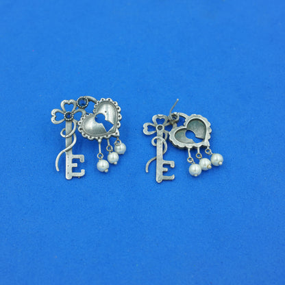 Kunjika- Silver Brass Oxidised dangler earrings (Blue)