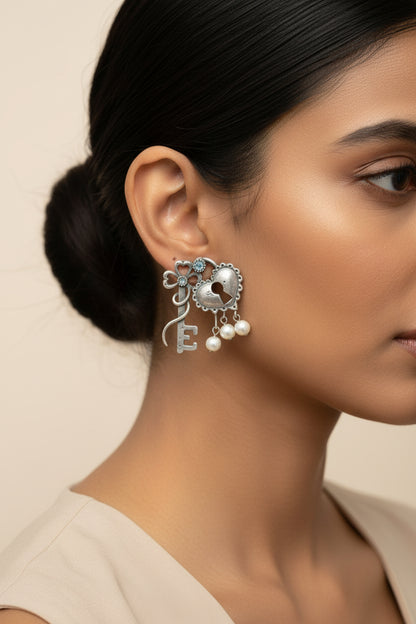 Kunjika- Silver Brass Oxidised dangler earrings (White)