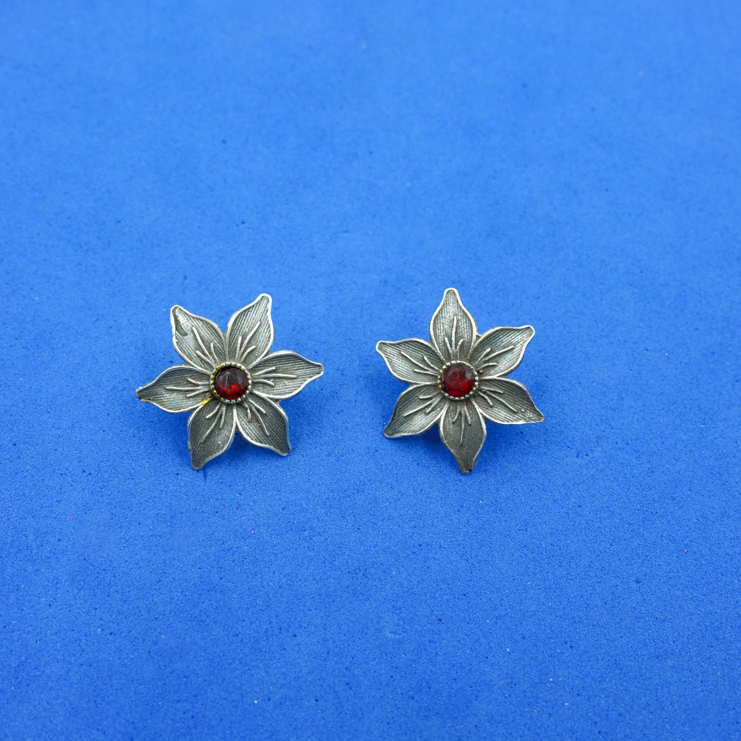 Juhi- Silver Brass Stone-Studded Stud Earrings(Red)