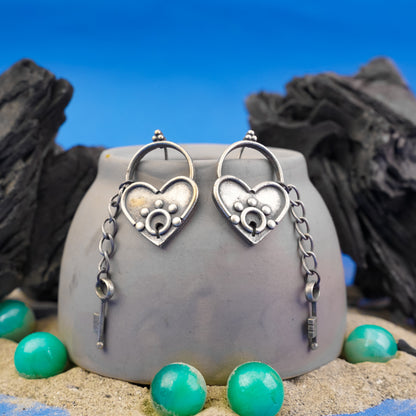 PremTaala- Silver Brass Oxidised dangler earrings