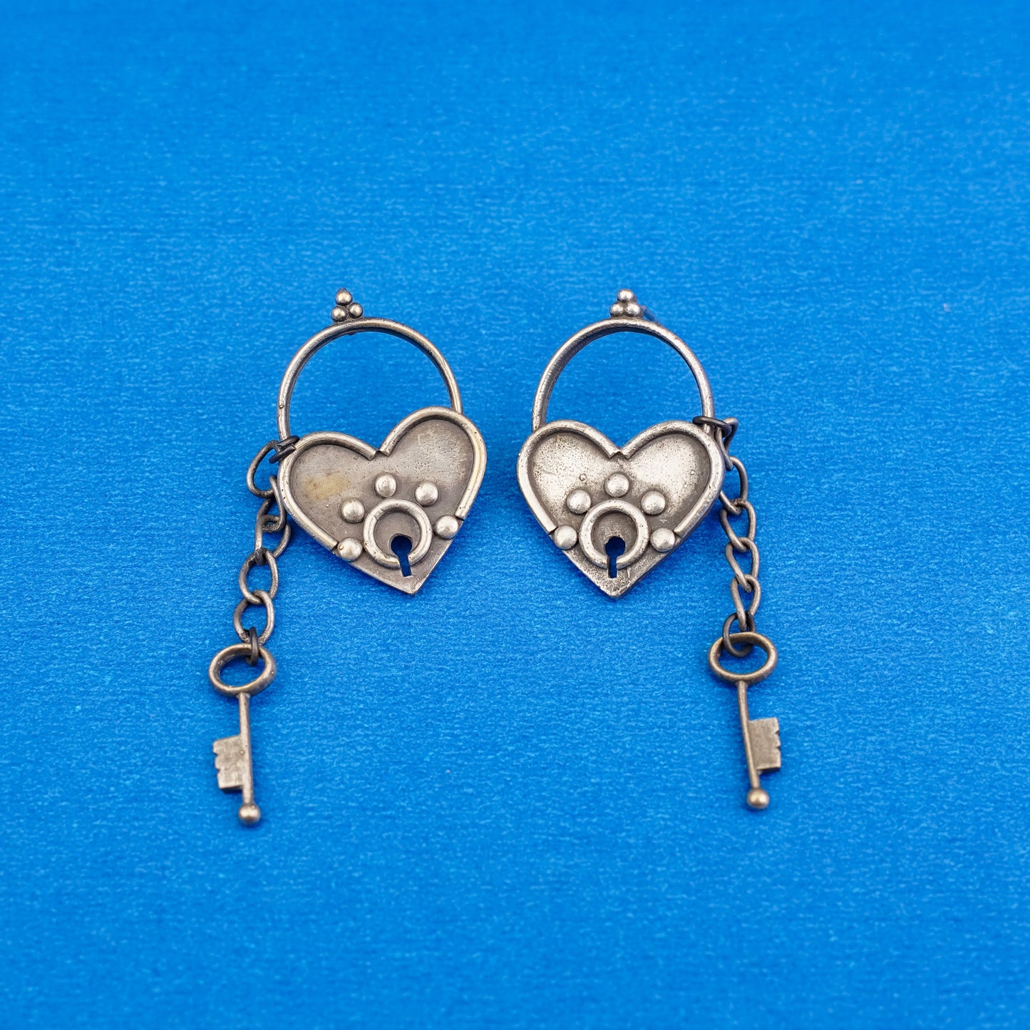 PremTaala- Silver Brass Oxidised dangler earrings