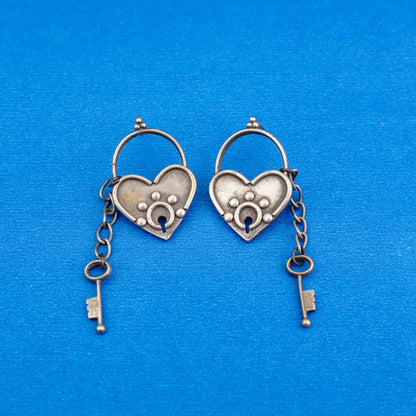 PremTaala- Silver Brass Oxidised dangler earrings
