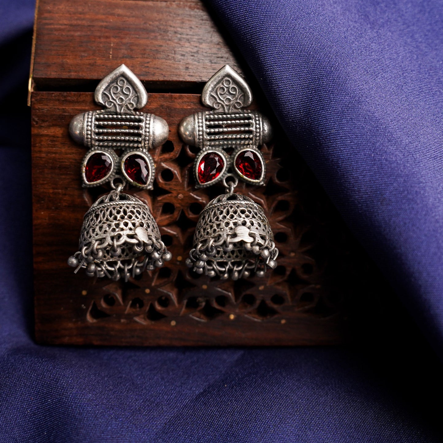 Taal- Silver Brass Oxidised jhumka earrings(Red)
