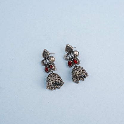Taal- Silver Brass Oxidised jhumka earrings(Red)