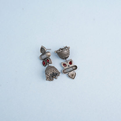 Taal- Silver Brass Oxidised jhumka earrings(Red)