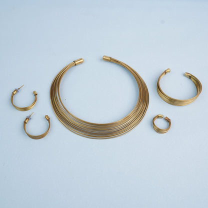 Chitrangada- Multistrand Brass polished Hasli with Earrings & Adjustable Ring