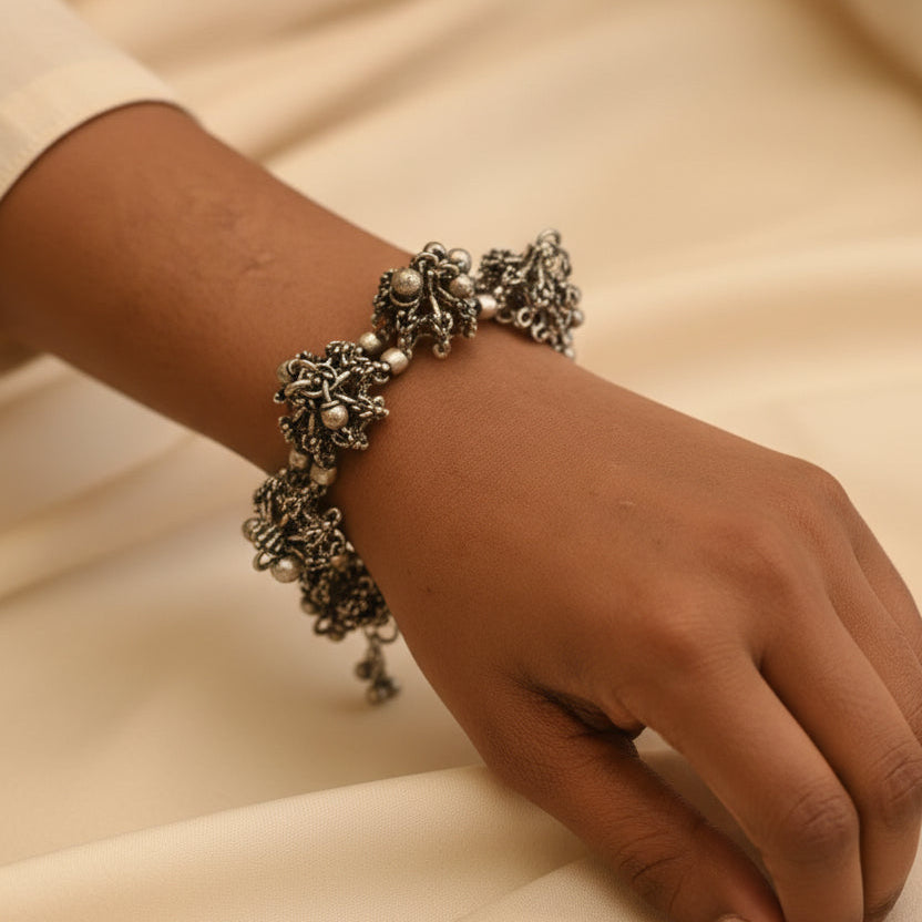 Jhilmil- Oxidised brass bracelet.